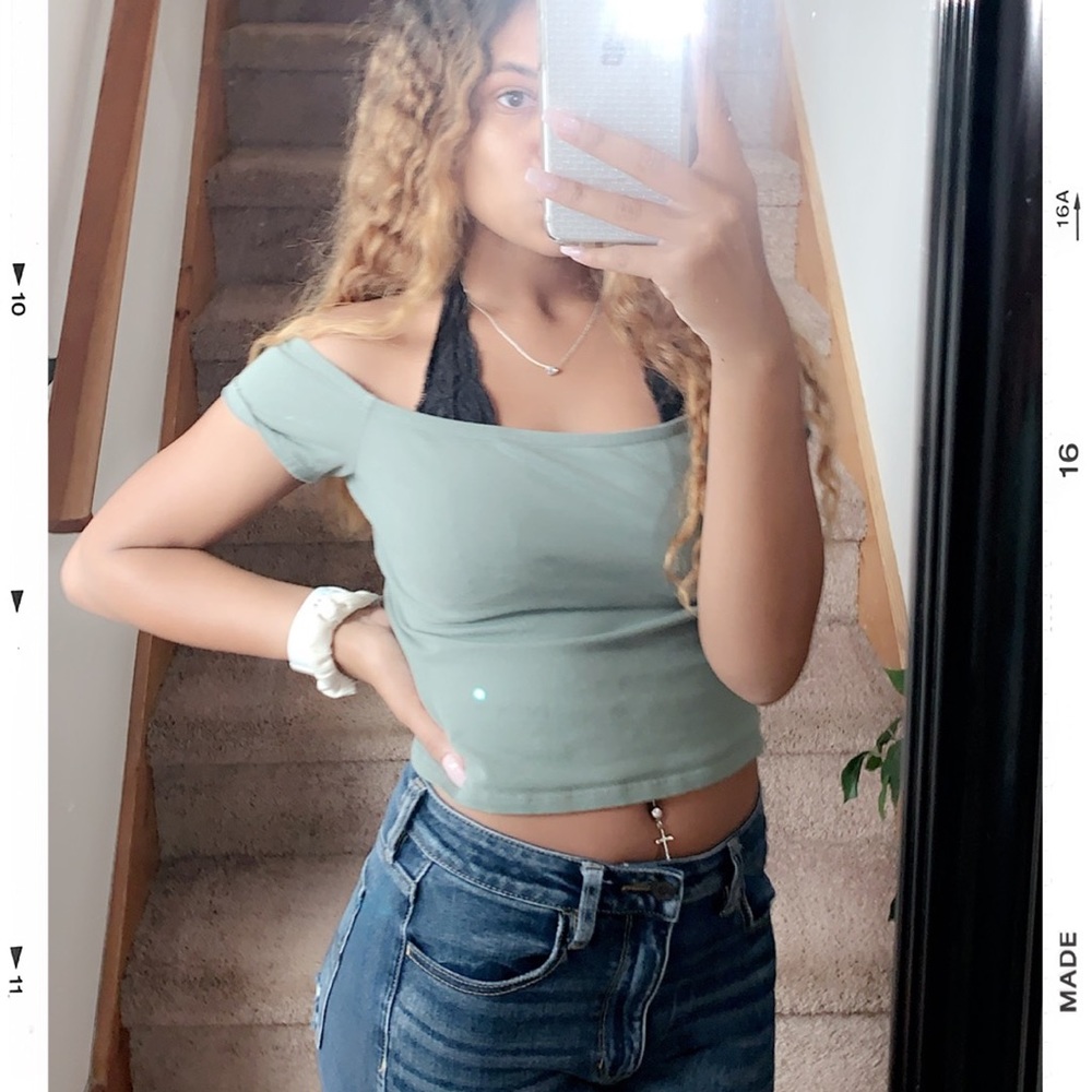 a green crop top